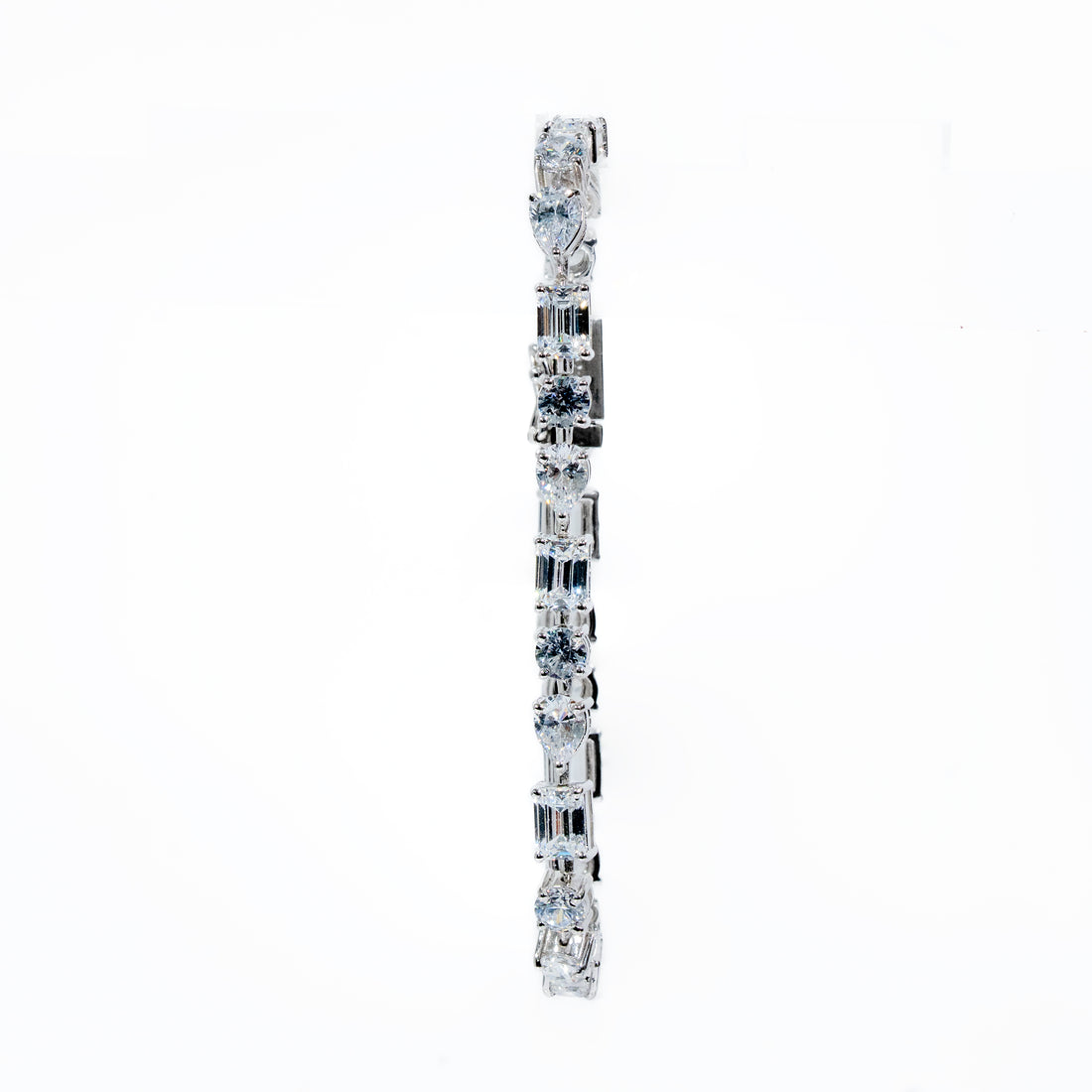 Alternate heart emerald and round tennis bracelets