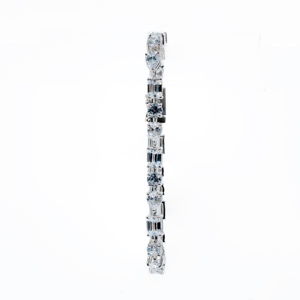 Alternate heart emerald and round tennis bracelets