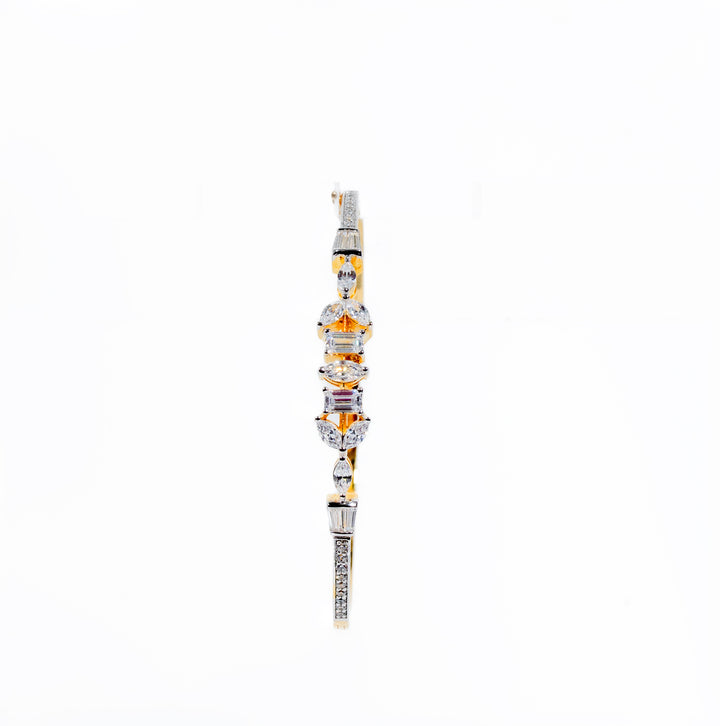 Alternate emerald and marquise bracelets